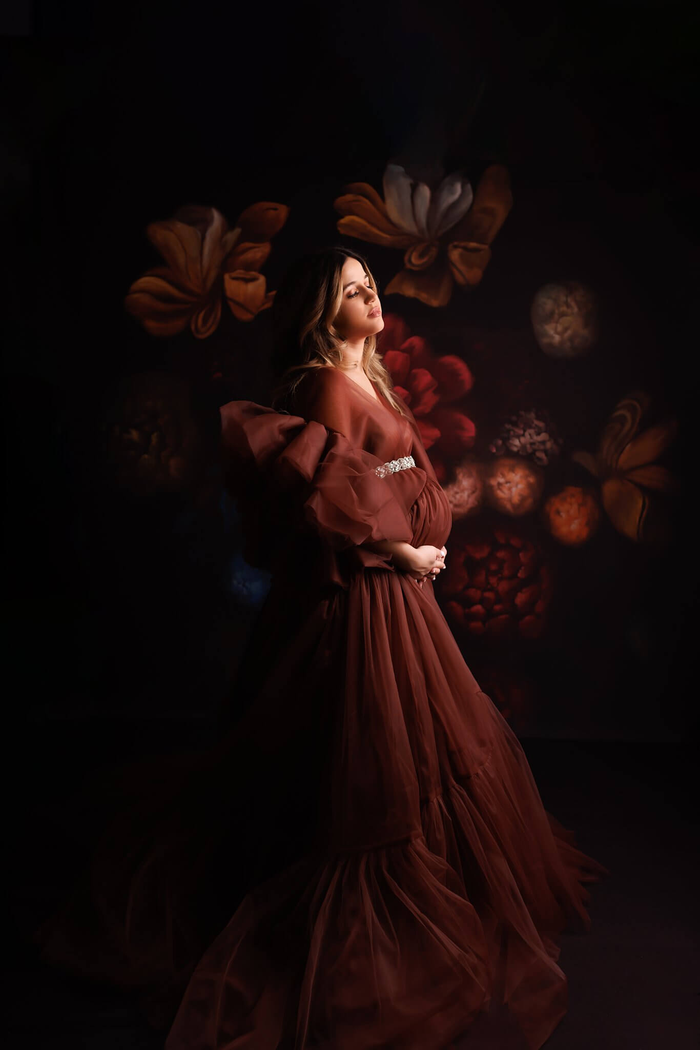 Toronto Maternity Photo by Shanna Parker Expectant Mother in a Rust Tulle gown holding her pregnant belly