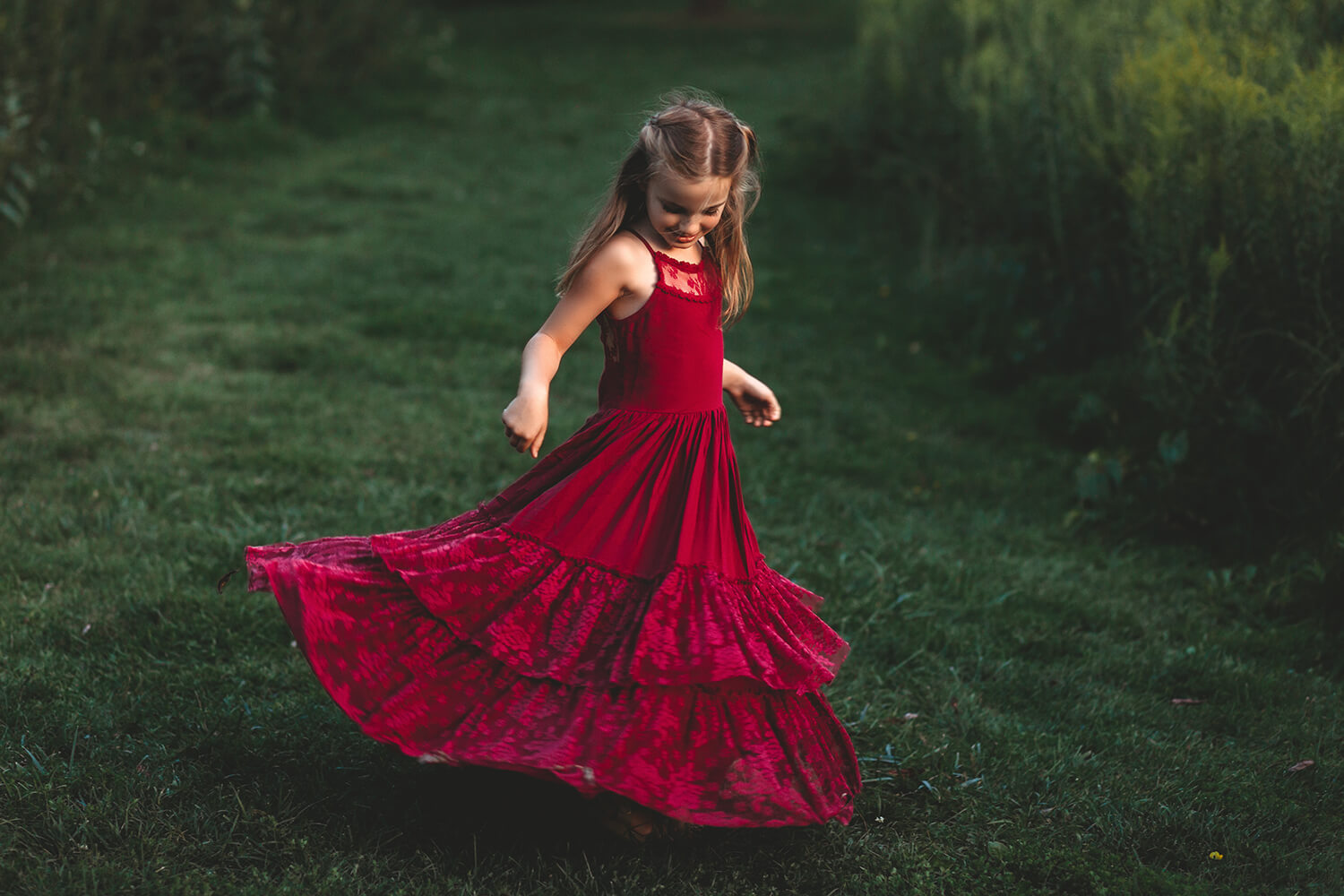 Family photo of daughter in red dress.